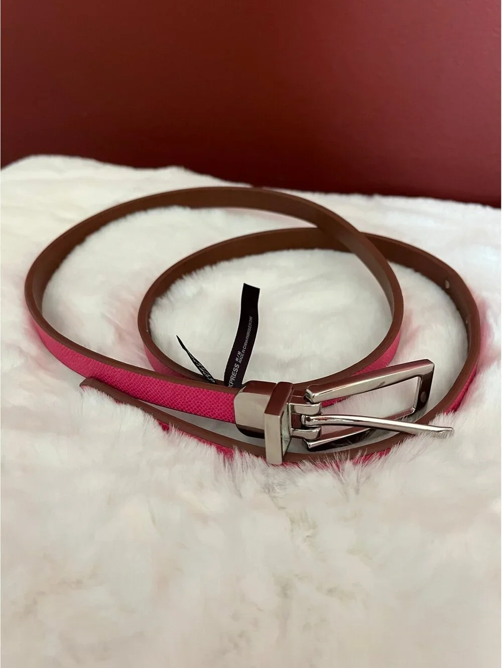 Express women’s size medium reversible pink and brown thin belt, silver har